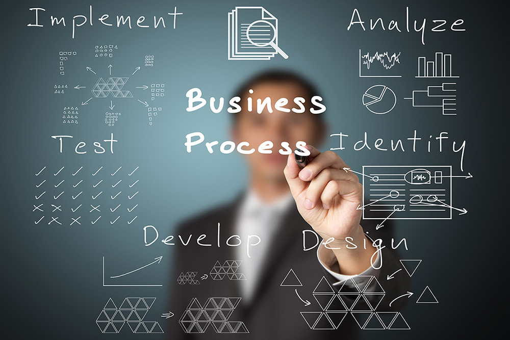 man sketching out a design process